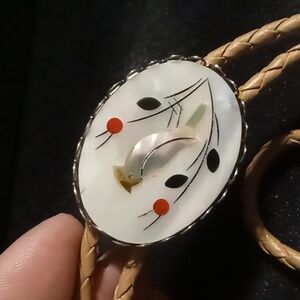 Vintage Mother Of Pearl Bird Design Bolo Tie Braided Tan Leather .